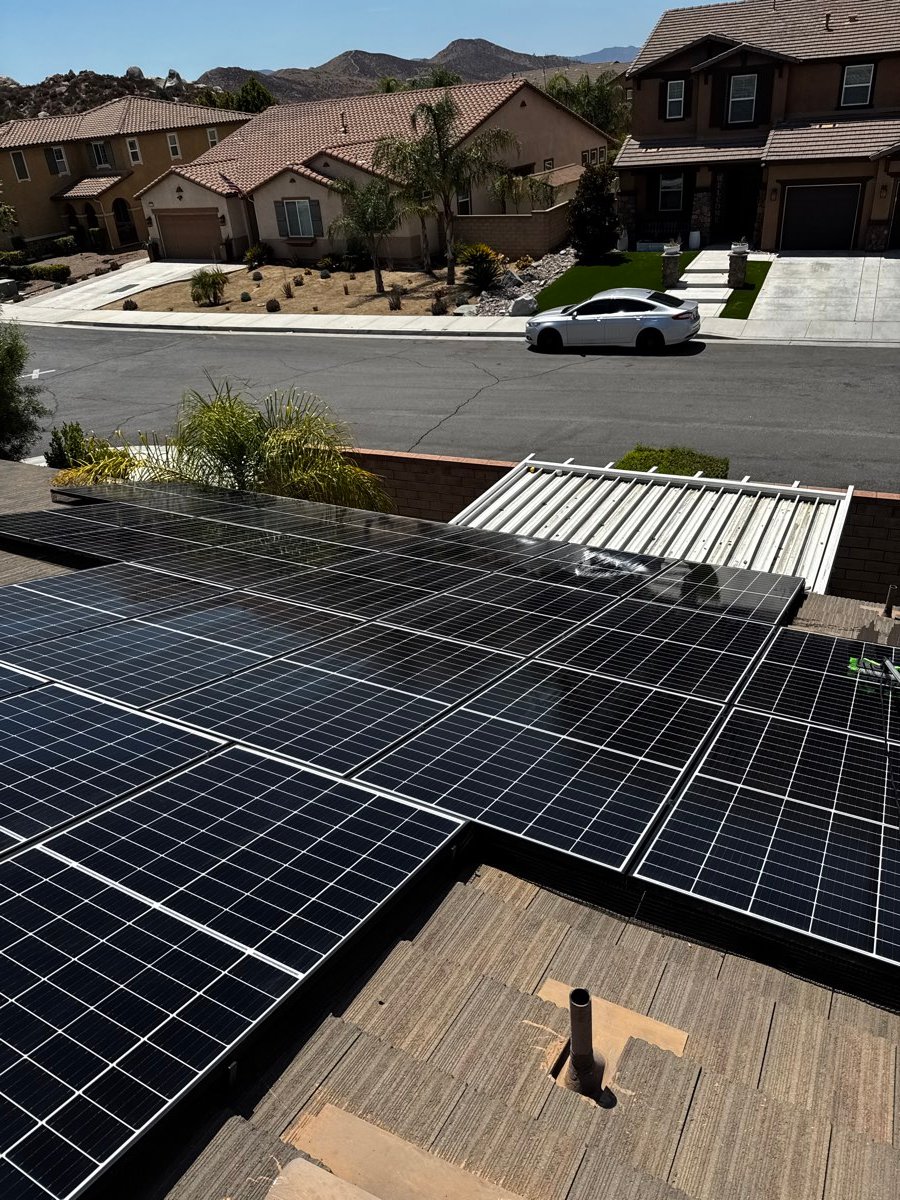 Aerial view of a tile roofline overlooking the neighborhood