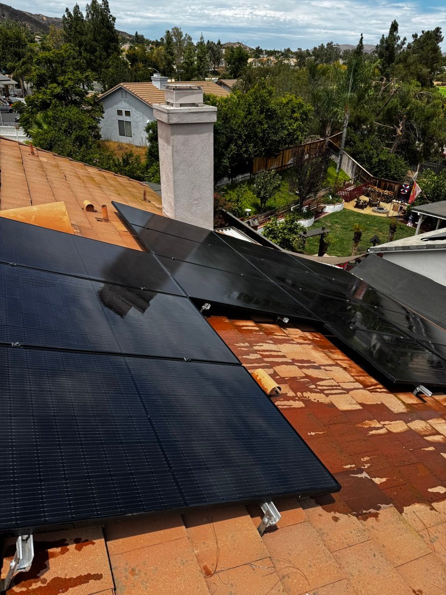 Aerial view of a tile roofline and backyard patio in Lake Elsinore